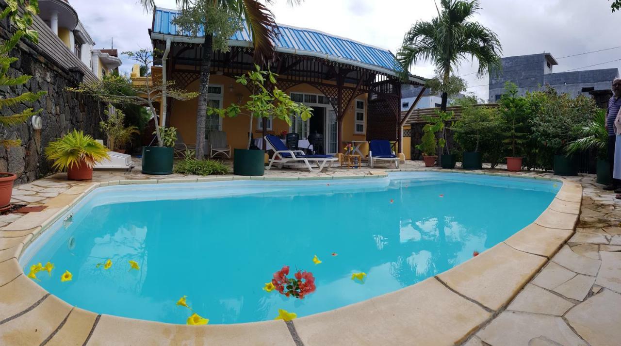 Villa Hibiscus บลู เบย์ ภายนอก รูปภาพ