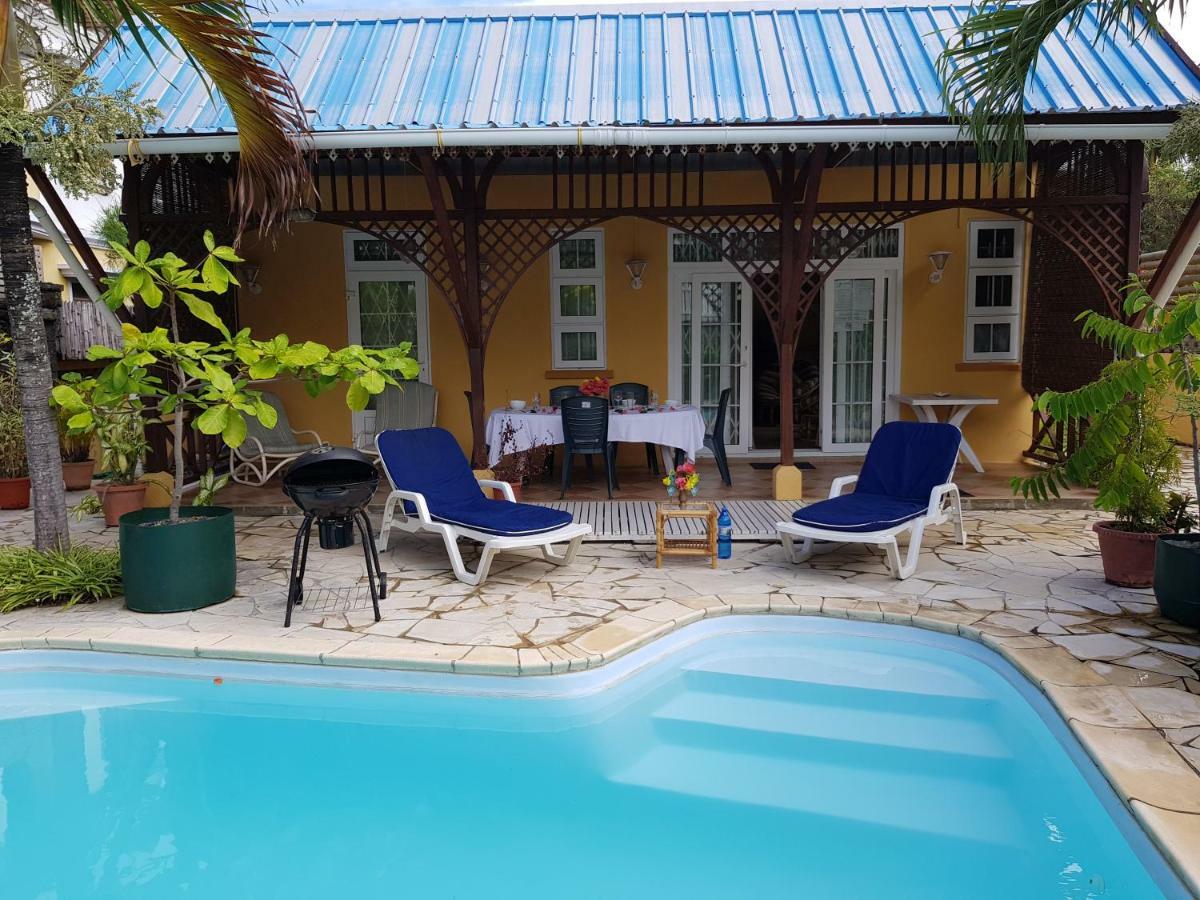 Villa Hibiscus บลู เบย์ ภายนอก รูปภาพ
